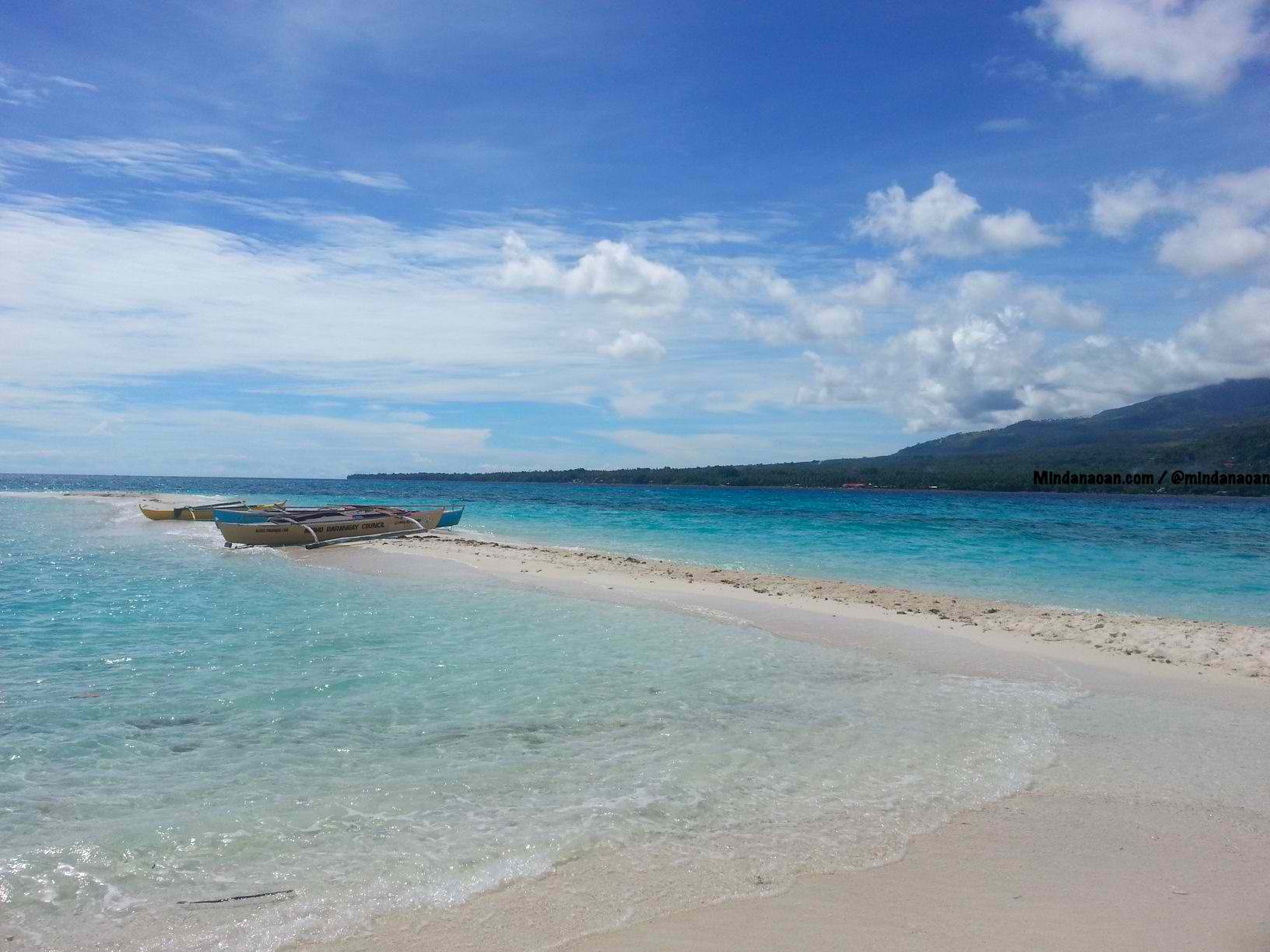Eating sea urchins at White Island Camiguin